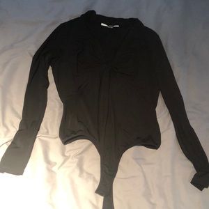 Black knotted long sleeve body suit